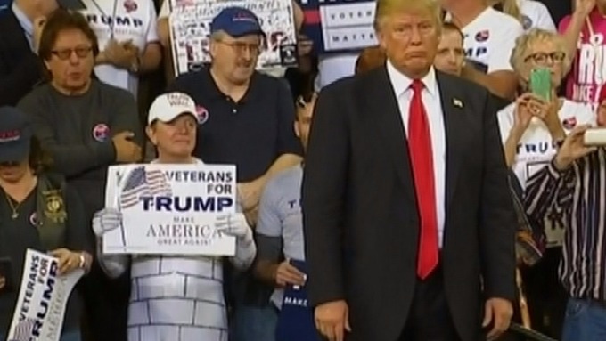 Man dressed as Trump's Mexican wall